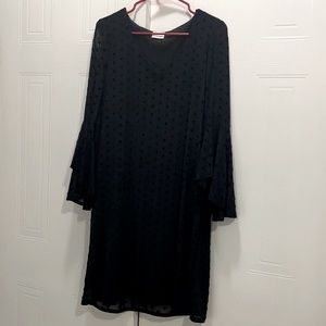 Black sheer polka dot dress with flared sleeves